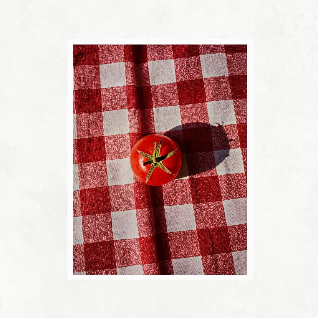 Tomato on Red Tablecloth